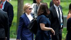 U.S. Democratic presidential candidate Hillary Clinton arrives for ceremonies to mark the 15th anniversary of the September 11 attacks at the National 9/11 Memorial in New York