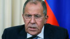 Russian Foreign Minister Lavrov speaks during joint news conference with French Foreign Minister Ayrault following their meeting in Moscow