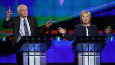 Democratic presidential candidates U.S. Senator Bernie Sanders and former Secretary of State Hillary Clinton debate during the first official Democratic candidates debate of the 2016 presidential campaign in Las Vegas