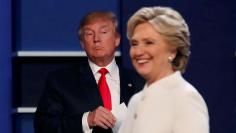 Republican U.S. presidential nominee Donald Trump and Democratic U.S. presidential nominee Hillary Clinton finish their third and final 2016 presidential campaign debate at UNLV in Las Vegas