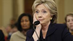 Democratic presidential candidate Hillary Clinton listens to a question as she testifies before the House Select Committee on Benghazi on Capitol Hill in Washington