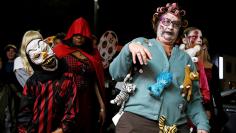 A cat lady in curlers Zombie takes part in the annual Silver Spring Zombie Walk in Maryland