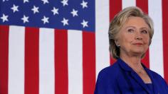 U.S. Democratic presidential nominee Hillary Clinton listens as she is introduced at a campaign rally in Las Vegas