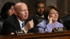 Joint Economic Committee members chairman Brady and co-chair Klobuchar  question Federal Reserve Board Chairman Bernanke at Joint Economic Committee in Washington