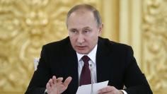 Russia's President Vladimir Putin attends a session of the Council for Civil Society and Human Rights in Moscow