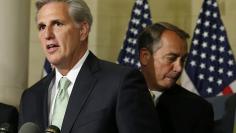 Newly elected House Majority Leader McCarthy steps up to the microphone as he is introduced by Speaker of the House Boehner in Washington