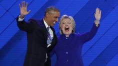 U.S. President Obama and Democratic presidential nominee Clinton appear onstage together after his speech on the third night at the Democratic National Convention in Philadelphia