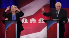 Democratic U.S. presidential candidate and former Secretary of State Hillary Clinton and rival candidate U.S. Senator Bernie Sanders speak simultaneously at the NBC News - YouTube Democratic presidential candidates debate in Charleston