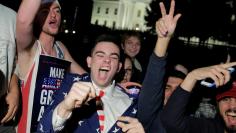 Supporters of Republican presidential candidate Donald Trump rally in front of the White House in Washington.