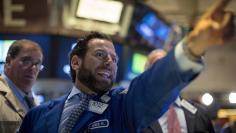Traders work on the floor of the New York Stock Exchange 