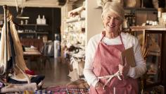 Portrait Of Female Owner Of Gift Store With Digital Tablet