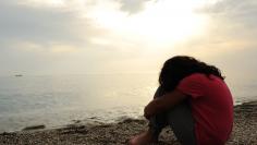 Sad girl on beach