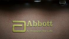 FILE PHOTO: An Abbott company logo is pictured at the reception of its office in Mumbai, India, September 8, 2015. REUTERS/Shailesh Andrade/File Photo   