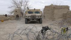 An Afghan National Army vehicle is seen parked at an outpost in Helmand province, Afghanistan