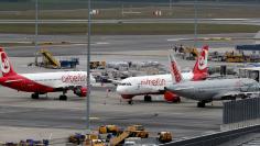 FILE PHOTO: Air Berlin aircraft parks next to a Niki airplane at Vienna International Airport in Schwechat