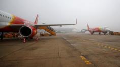 FILE PHOTO: VietJet aircrafts are seen at Noi Bai International airport in Hanoi