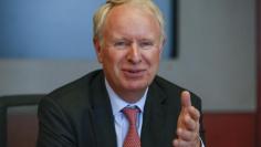 Allergan Chief Executive David Pyott speaks during an interview in New York July 8, 2014. REUTERS/Shannon Stapleton 