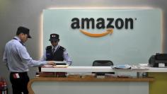 Security guards stand at the reception desk of the Amazon India office in Bengaluru, India, August 14, 2015.  REUTERS/Abhishek N. Chinnappa