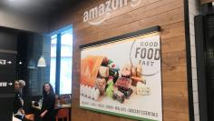 Signage is seen inside Amazon’s first cash register-free grocery store, in Seattle, Washington, U.S., January 18, 2018. Photo taken January 18, 2018.   REUTERS/Jeffrey Dastin