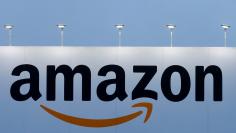 FILE PHOTO - The logo of Amazon is seen at the company logistics center in Lauwin-Planque northern France