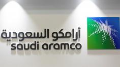 FILE PHOTO: Logo of Saudi Aramco is seen at the 20th Middle East Oil & Gas Show and Conference in Manama