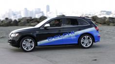 An autonomous car from Delphi departs Treasure Island for a cross-country trip from San Francisco to New York City in San Francisco, California March 22, 2015. REUTERS/Stephen Lam  