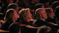 Former U.S. Secretary of State and 2016 Democratic presidential nominee Hillary Clinton listens to her husband, former U.S. President Bill Clinton speak during the 2018 MusiCares Person of the Year show honoring Fleetwood Mac at Radio City Music Hall in 