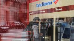 FILE PHOTO: A customer uses an ATM at a Bank of America branch in Boston, Massachusetts, U.S., October 11, 2017. REUTERS/Brian Snyder/File Photo  