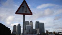 The Canary Wharf financial district is seen in east London November 12, 2014. REUTERS/Suzanne Plunkett 