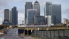 The Canary Wharf financial district is seen in east London November 12, 2014. REUTERS/Suzanne Plunkett 