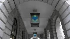 FILE PHOTO: The logo of Barclays bank is seen on glass lamps outside of a branch of the bank in the City of London financial district in London September 4, 2017. REUTERS/Toby Melville /File Photo