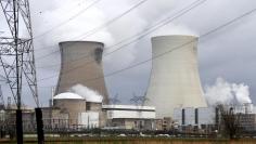 Steam billows from the cooling towers of the Doel nuclear plant of Electrabel in Doel near Antwerp