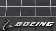 The Boeing logo is seen at their headquarters in Chicago, in this April 24, 2013 file photo. REUTERS/Jim Young/File Photo