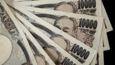 A picture illustration shows Japanese 10,000 yen notes featuring a portrait of Yukichi Fukuzawa, the founding father of modern Japan, taken in Tokyo August 2, 2011.  REUTERS/Yuriko Nakao/File Photo  