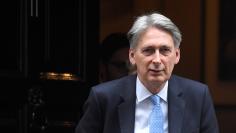 File Photo: Britain's Finance Secretary Philip Hammond leaves 11 Downing Street, London, Britain, November 15, 2017. REUTERS/Toby Melville