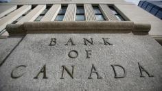 FILE PHOTO: A sign is pictured outside the Bank of Canada building in Ottawa, Ontario, Canada on May 23, 2017. REUTERS/Chris Wattie/File Photo