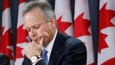 Bank of Canada Governor Stephen Poloz takes part in a news conference upon the release of the Financial System Review in Ottawa June 12, 2014. REUTERS/Chris Wattie 