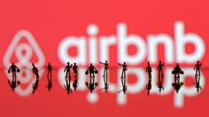 FILE PHOTO: A 3D printed people's models are seen in front of a displayed Airbnb logo in this illustration taken, June 8, 2016. REUTERS/Dado Ruvic/Illustration/File Photo