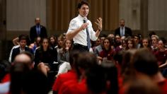 FILE PHOTO:    Canada's Prime Minister Justin Trudeau speaks during a town hall with high school students in Ottawa, Ontario, Canada, November 3, 2016. REUTERS/Chris Wattie/File Photo