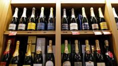 FILE PHOTO - Bottles of champagne are displayed December 21, 2016 at a Nicolas French wine specialist store in Paris, France.  Picture taken December 21, 2016.  REUTERS/Charles Platiau