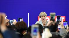 British Prime Minister Theresa May attends an event at Wuhan University in Wuhan, Hubei province, China January 31, 2018.  REUTERS/Stringer  