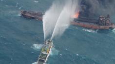 FILE PHOTO - A rescue ship works to extinguish the fire on the stricken Iranian oil tanker Sanchi in the East China Sea, on January 10, 2018 in this photo provided by Japan’s 10th Regional Coast Guard. Picture taken on January 10, 2018.  10th Regional 