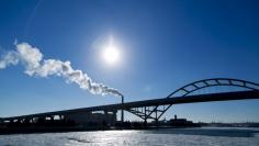 FILE PHOTO: Steam is seen drifting from a factory over the Hoan Bridge in Milwaukee, Wisconsin, in this February, 6, 2014 file photo.  REUTERS/Darren Hauck/Files 