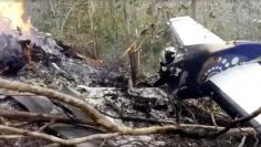 Wreckage in flames after a plane crashed in the mountainous area of Punta Islita, in the province of Guanacaste, in Costa Rica in this still image taken from social media video December 31, 2017.  Ministerio de Seguridad Publica de Costa Rica/via REUTERS