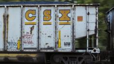 A CSX gondola car full of coal moves through the switchyard in Brunswick, Maryland October 16, 2012.  REUTERS/Gary Cameron