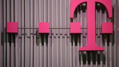 The logo of German company Deutsche Telekom is pictured at the CeBit computer fair in this file photo taken in Hanover, March, 6, 2012.  REUTERS/Fabian Bimmer 