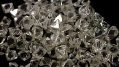 Uncut diamonds from southern Africa and Canada are seen at De Beers headquarters in London