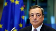 FILE PHOTO - European Central Bank (ECB) President Mario Draghi waits to address the European Parliament's Economic and Monetary Affairs Committee in Brussels, Belgium September 25, 2017. REUTERS/Francois Lenoir