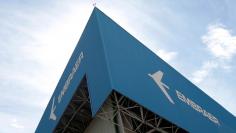 The logo of Brazilian jets maker Embraer is seen on a factory in Sao Jose dos Campos