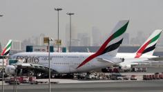 FILE PHOTO: Emirates Airlines aircraft are seen at Dubai International Airport